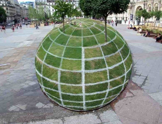The grass sphere outside Paris City Hall is actually flat. 