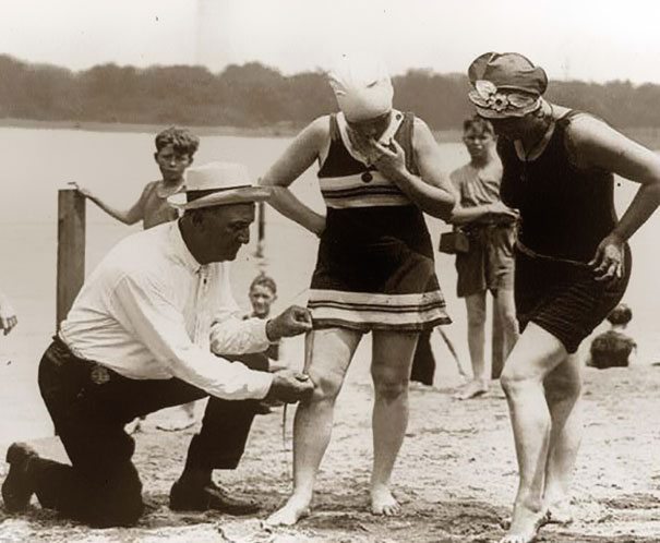 Measuring bathing suits – if they were too short, women would be fined, 1920′s